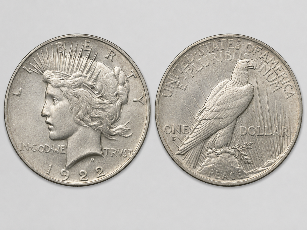 1922 Peace silver dollar obverse and reverse showing Liberty radiant-crown portrait and eagle perched on a rock with PEACE below.