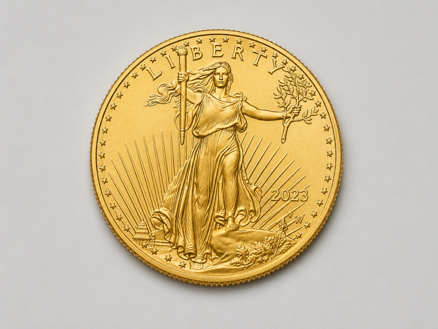1 troy ounce American Gold Eagle bullion coin, obverse showing Saint-Gaudens Liberty walking with torch and olive branch.