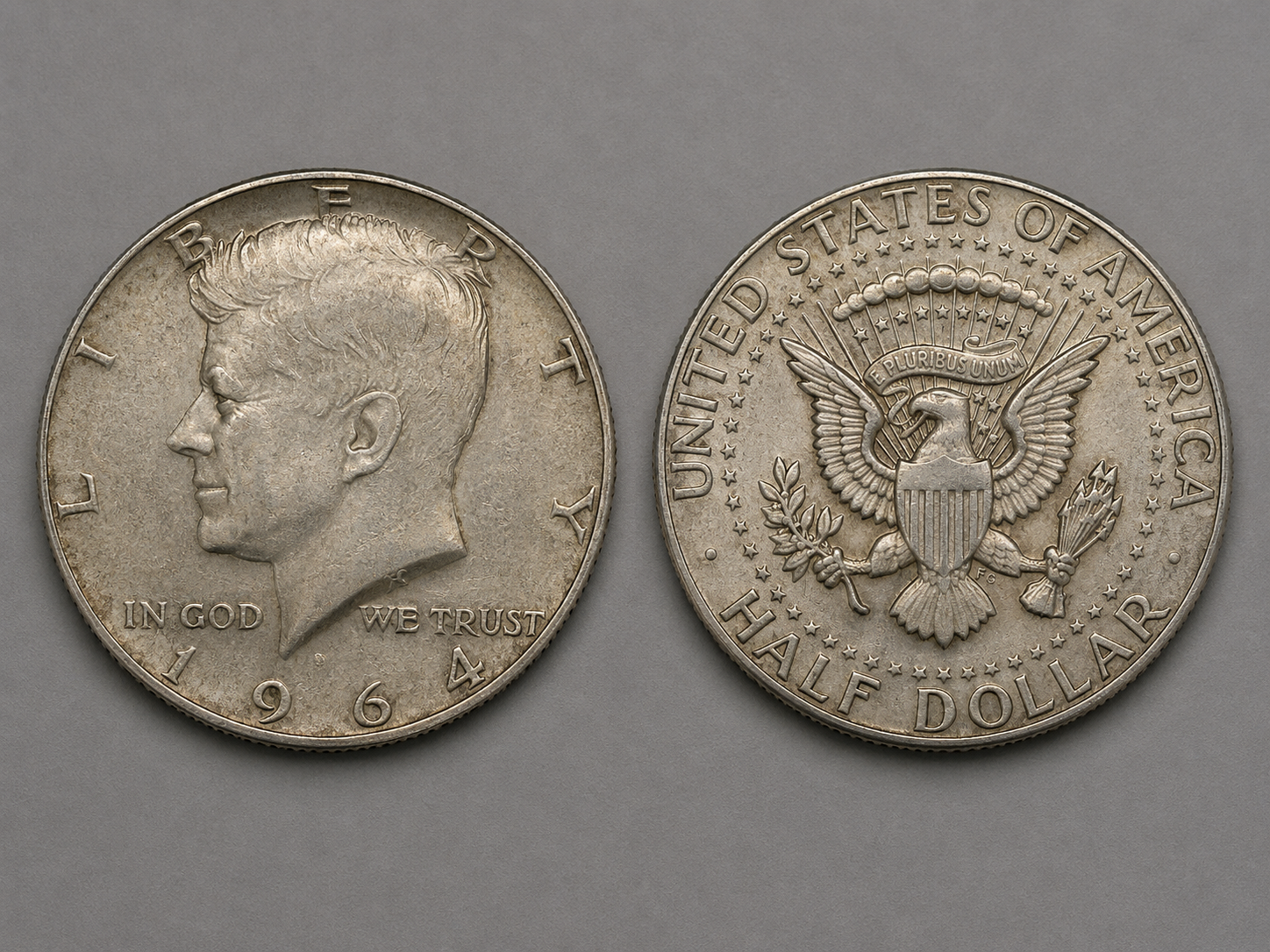 Kennedy half dollar obverse and reverse showing John F. Kennedy profile and heraldic eagle.